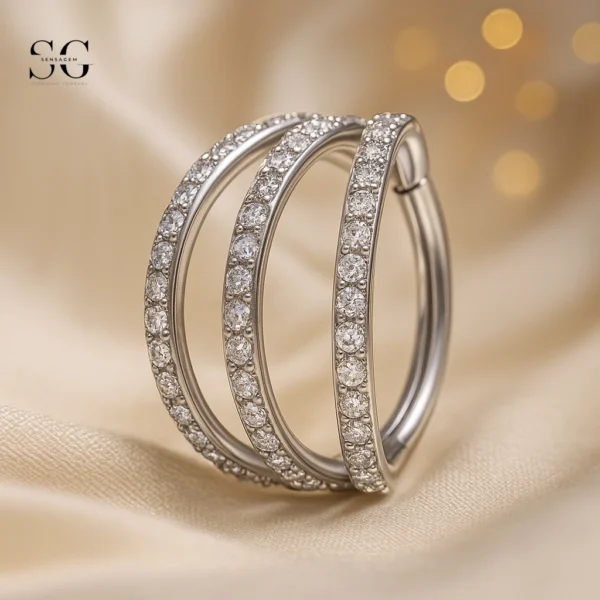 SGYS2015 - F136 Titanium Segment Clicker Ring with Triple Zircon Design