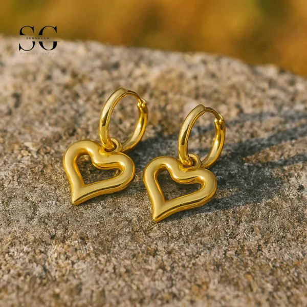 SG9059 Gold Hollow Heart Hoops – Stylish Ear Piercing Women Jewelry